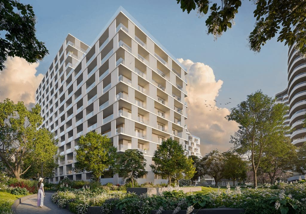 A Marina City negyedik ütem látványterve. A lakóépület előtt fák és virágoskert, mögötte felhős ég látható.